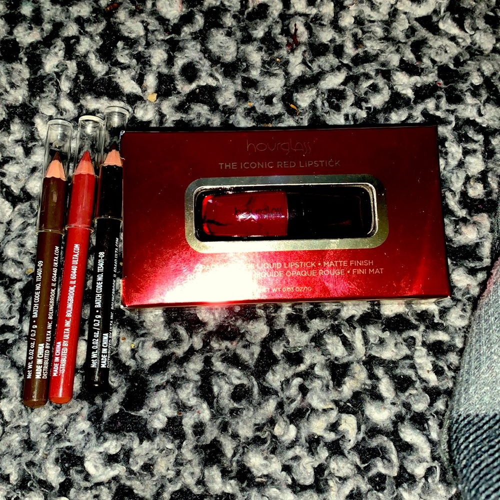 Makeup lip liners, brow pencil and the ultimate famous red lipstick